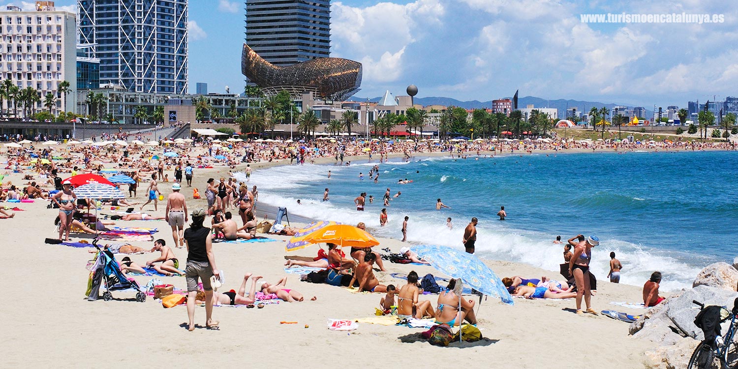 descubre playa somorrostro cerca torres puerto olimpico barcelona